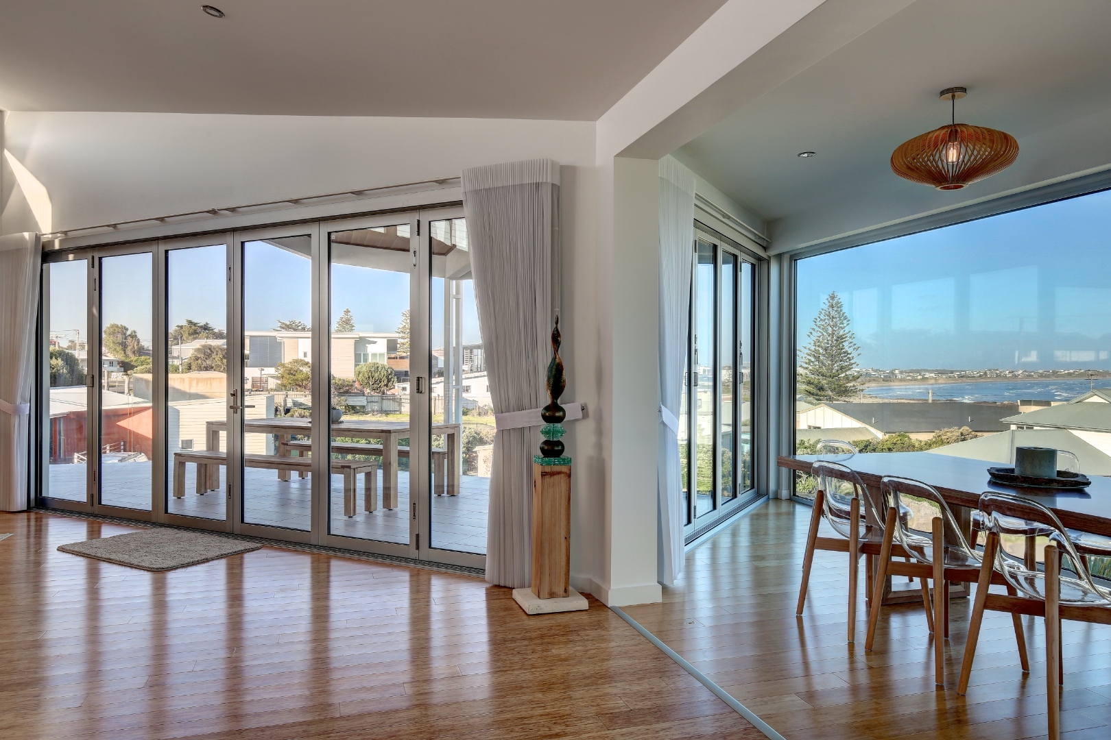 Middleton SA — living room bifold doors open to timber deck