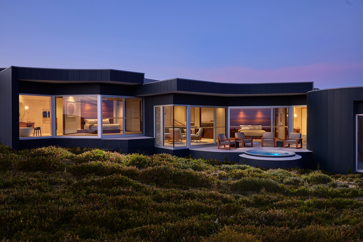 Southern Ocean Lodge — Remarkable Suite exterior with sliding glass doors