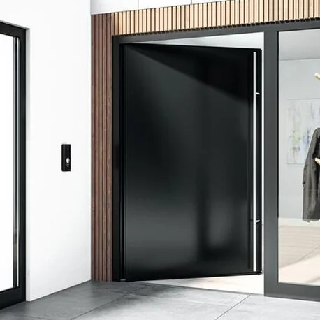Dark Schüco AD UP 75 entrance door with a glazed side element in a private home