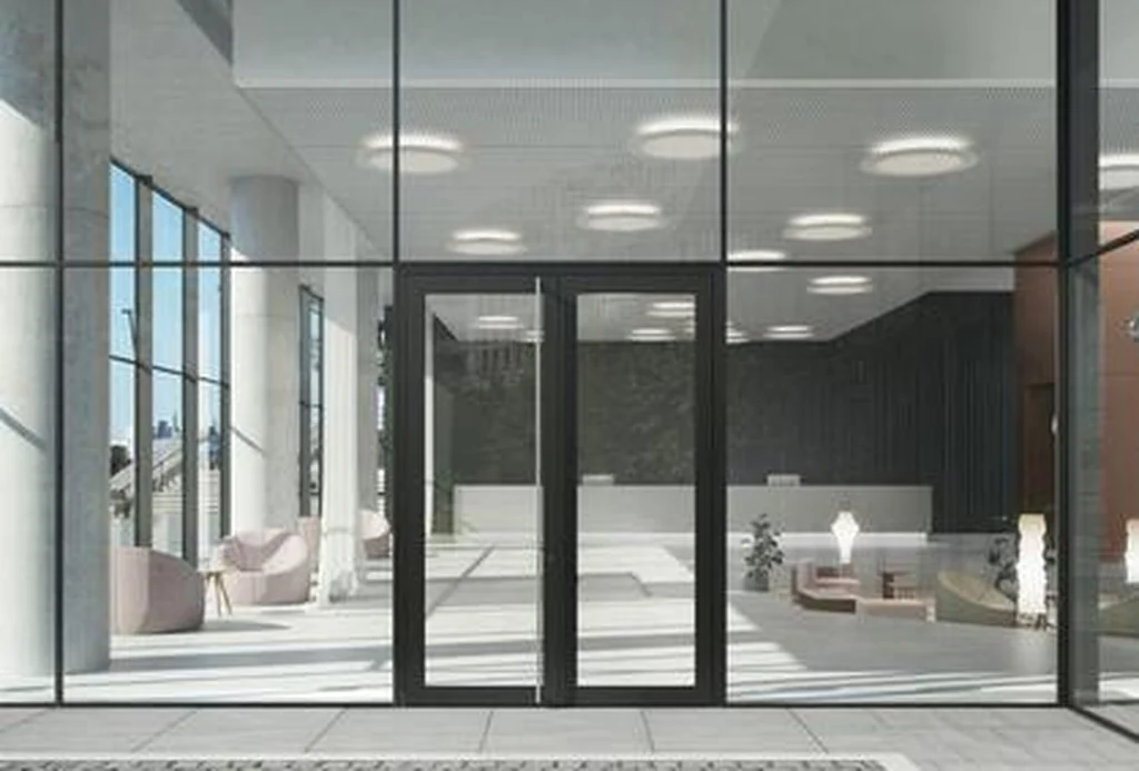 Commercial entrance lobby with double Schüco AD UP 90 glazed doors