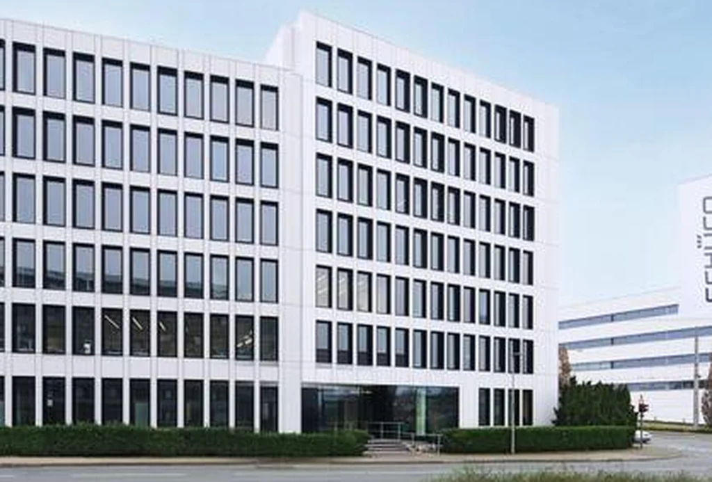 Commercial building clad in a Schüco AF UDC 80 unitised aluminium façade
