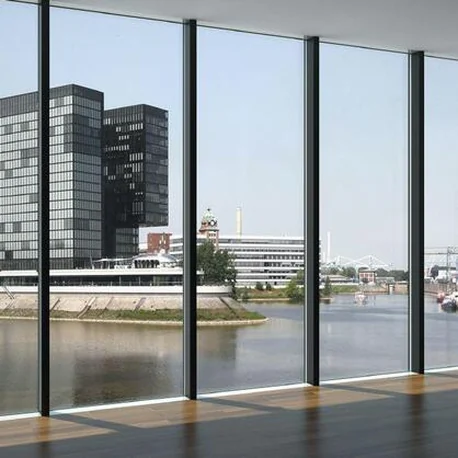 Riverside commercial interior behind a full-height FWS 60 façade