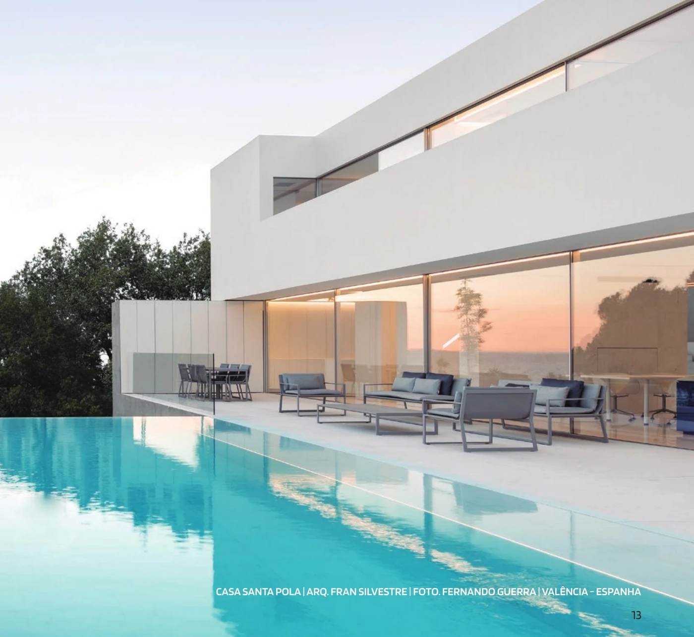 Casa Santa Pola — a continuous glazed elevation on Sosoares OS minimalist sliding units facing the pool terrace