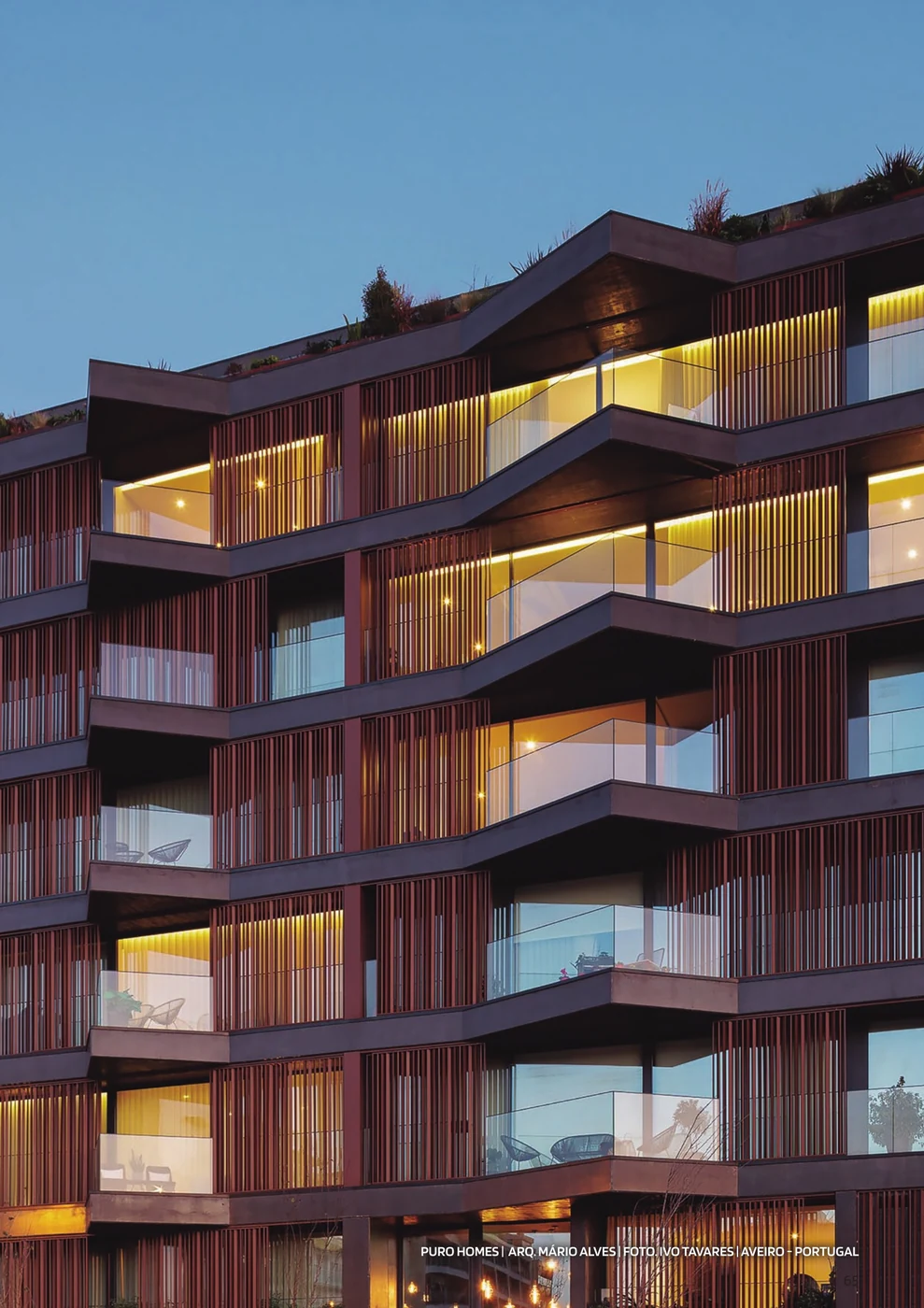 Puro Homes, Aveiro — stacked balconies with Sosoares AV aluminium-and-glass balustrades